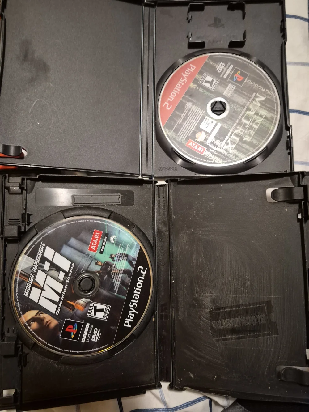 Sony PlayStation 2 Game Disc Bundle with Black and Red Cases. Lot Of 6
